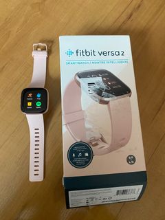 Montre fitbit hot sale versa darty