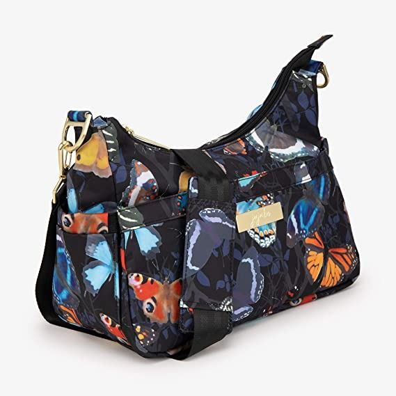 Jujube Hobobe Social Butterfly (Category: Shoulder Bags) located in San Juan City. Submitted by chaitealover (Listing ID 1213997007, Image 3). Description: This classic hobo-style bag is sure to become a staple of your wardrobe, both while your baby is still in diapers and long after. There are plenty of pockets to keep your and baby’s stuff organized, and a zippered closure at the top keeps it all safely inside. When your little one has outgrown