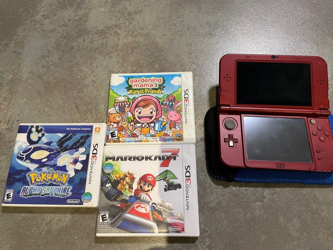 New 3DS XL BUNDLE (Category: Nintendo) located in Makati City. Submitted by treeman00000 (Listing ID 1214076541, Image 1). Description: 3DS Unit Mumu Pouch Rep AC Charger Gardening Mama Mario Kart 7 Pokémon Alpha Sapphire .
