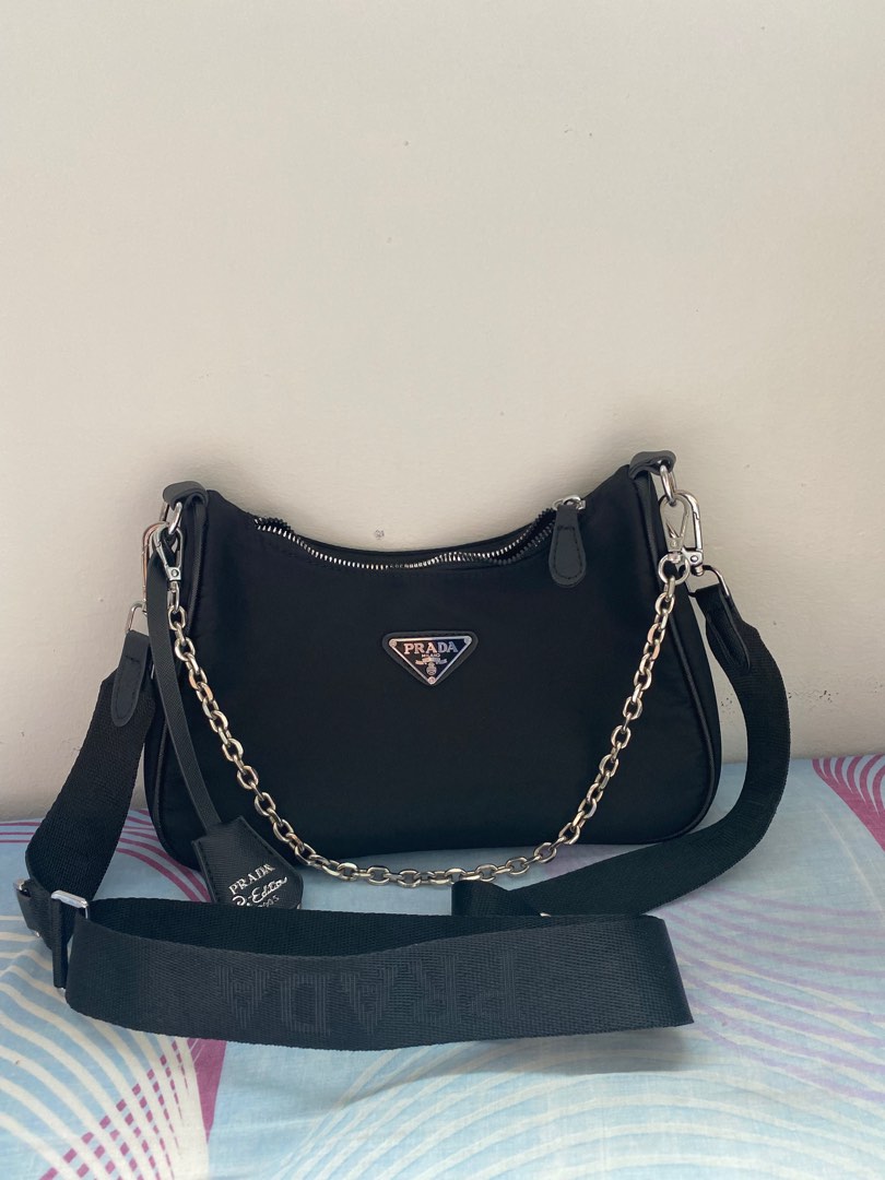 Prada Nylon FREE 1 bag, Women's Fashion, Bags & Wallets, Cross-body Bags on  Carousell