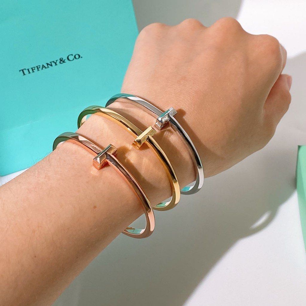 Tiff. Free shipping ready stock with box 2021 new three-dimensional glossy  T bracelet fashion couple bracelet, Women's Fashion, Jewelry & Organisers,  Bracelets on Carousell