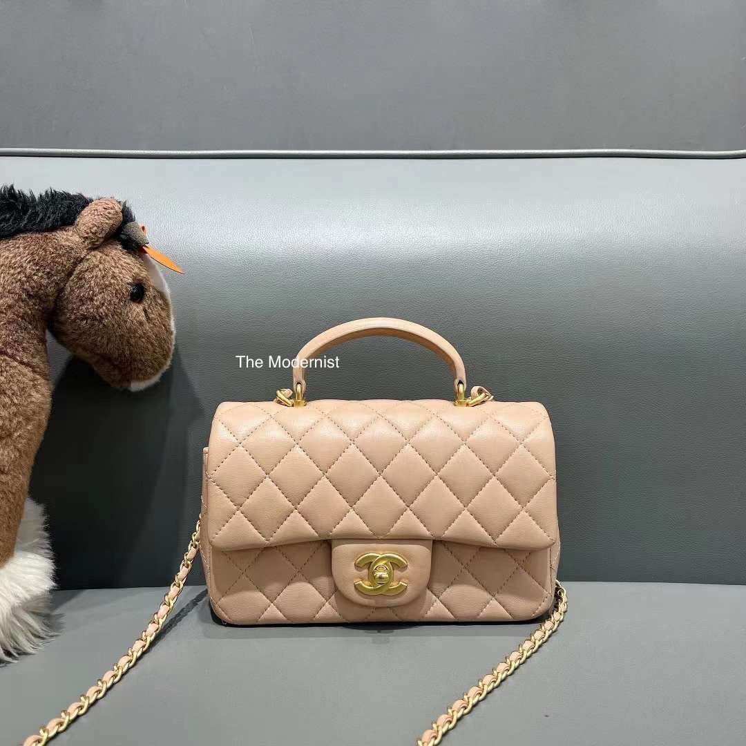 Authentic Chanel Mini Flap Bag with Top Handle Beige Lambskin Matte Gold  Hardware, Luxury, Bags & Wallets on Carousell