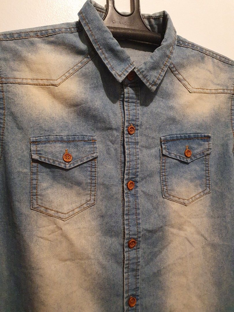 Denim Short Sleeve Shirt (Preloved) (Category: Tshirts & Polo Shirts ) located in Makati City. Submitted by jxyms (Listing ID 1214341685, Image 3). Description: PERSONAL Preloved Clothes Brand: Local Brand Size: Medium *Photo taken with warm ceiling lights..
