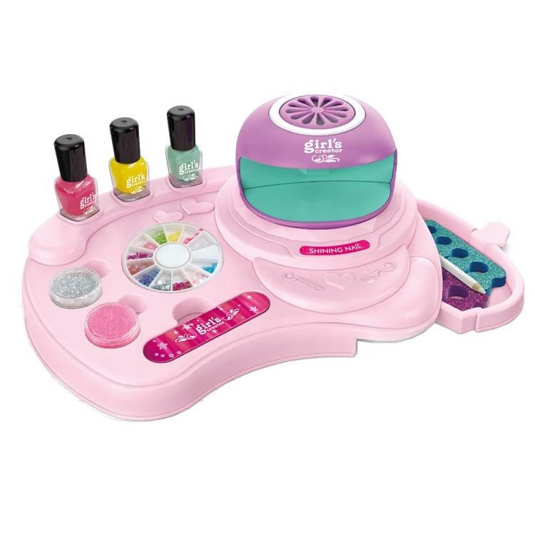 Manicure Set (Category: Kids Toys) located in Singapore. Submitted by mum101 (Listing ID 1214200529, Image 1). Description: Features & details ✿ COMPLETE NAIL KIT: Everything you need to create glitter nail art right at your fingertips. With plenty of sparkle, this kit includes: 1 Nail dryer,1 Storage desk,3 Nail polish,2 Boxes of glitter powder,1 White crayon,1nail file,2 Toe separators,1 Sticky nail gems. It makes a great gift ✿ EASY CLEAN-UP: 
