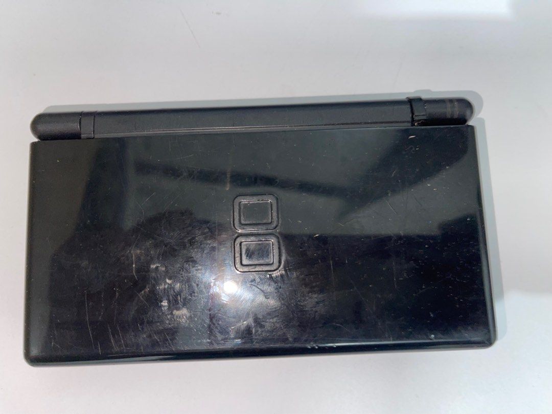 Nintendo DS Lite USG-001 Pure Black (Category: Nintendo) located in Taguig. Submitted by johnhb (Listing ID 1214346341, Image 2). Description: What you see is what you get. For serious collectors, repair, parts or restoration No refunds or warranty. Buy at your own risk MOP: GCash MOD: Lalamove from BGC (No COD!).