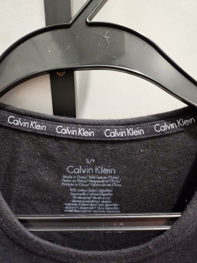 Original Calvin Klein black t shirt, Men's Fashion, Tops & Sets, Tshirts &  Polo Shirts on Carousell