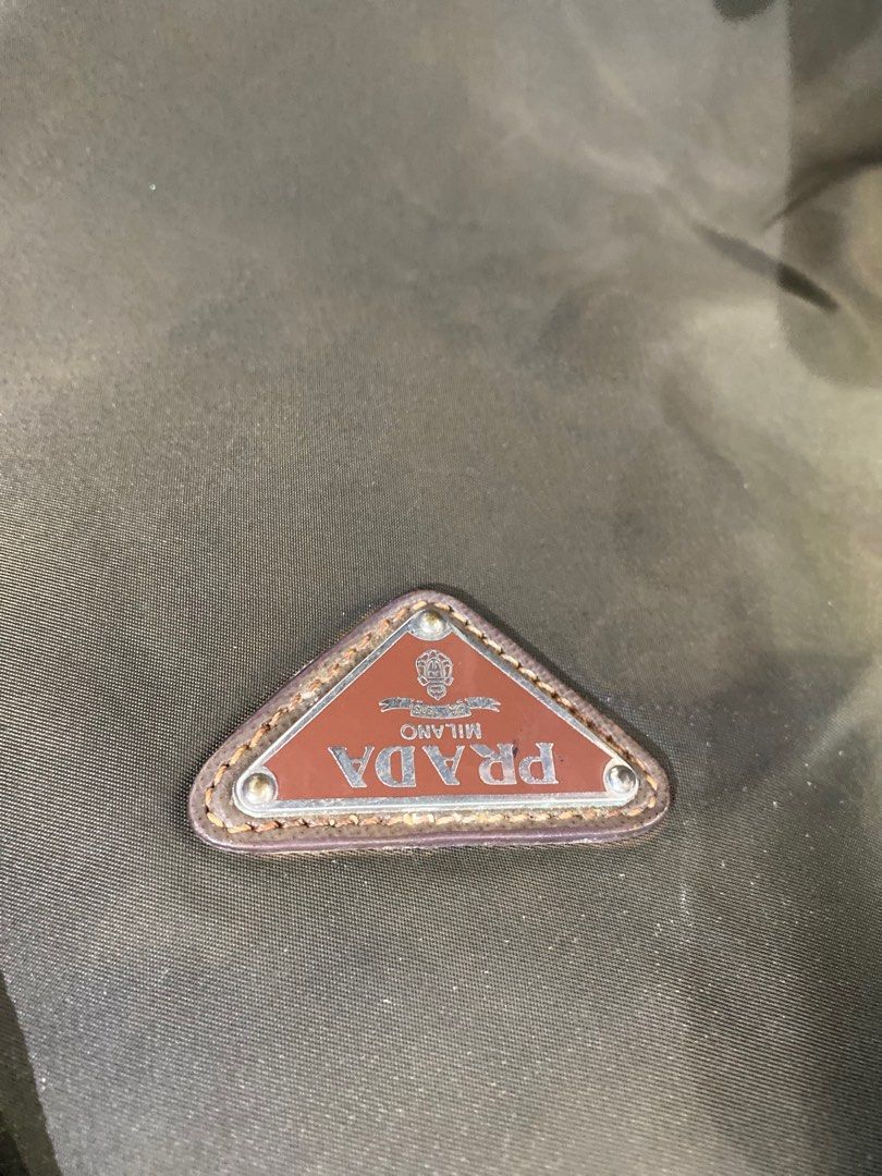 Prada Army green backpack on Carousell