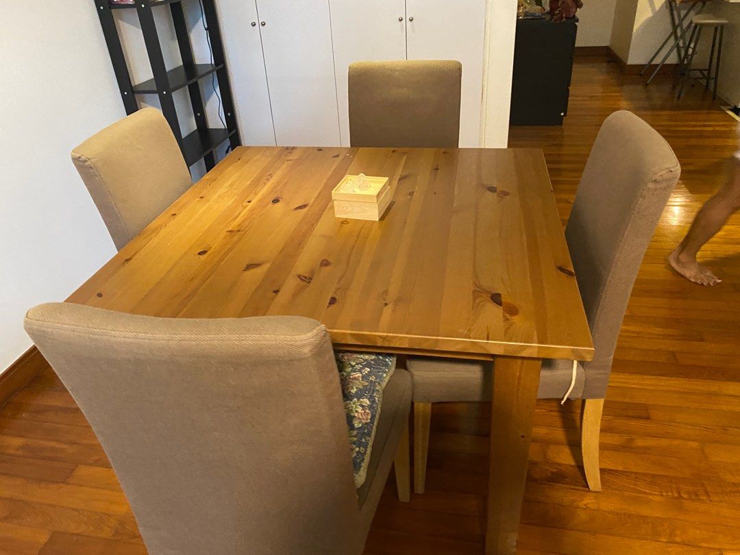 Solid Pine Stornas Dining Table (Category: Tables & Sets) located in Singapore. Submitted by tanlady123 (Listing ID 1214293930, Image 3). Description: Stornas solid pine square dining table. Solid wood. Table only. 106 cm by 105 cm by height 75 cm. Table in good condition. Self-collect at Blk 117, Bishan St 12. .