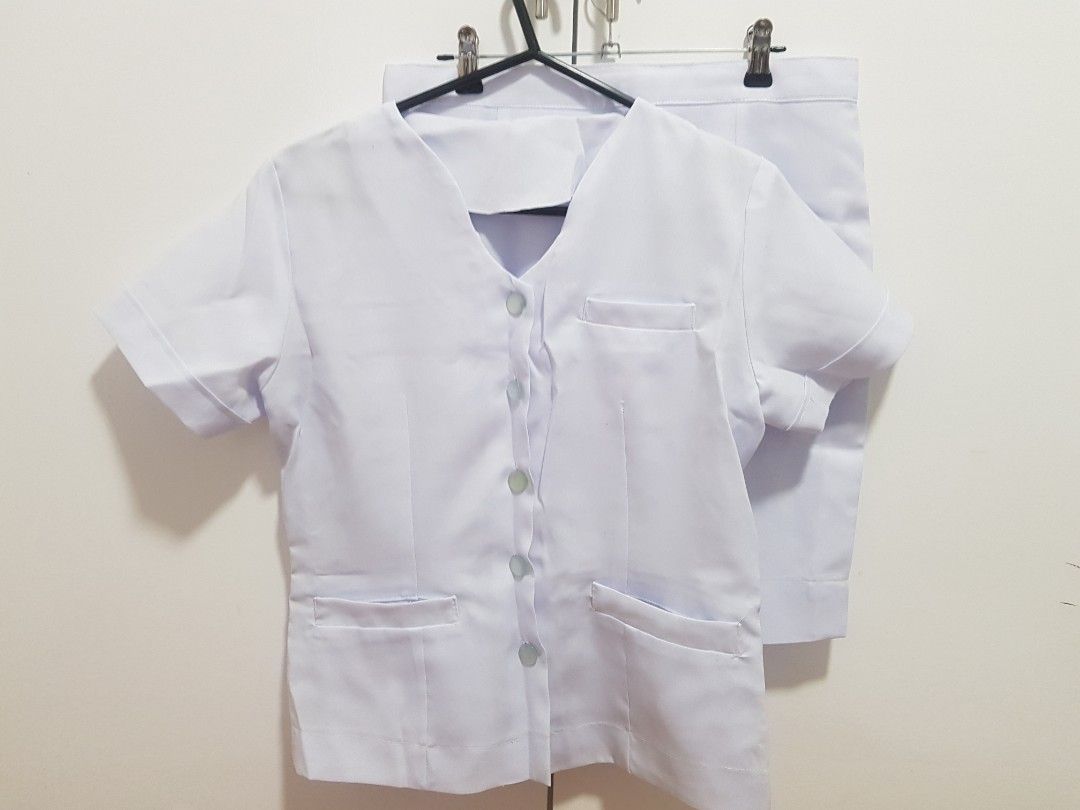 White Uniform (1 set, top & skirt) (Category: Sets or Coordinates) located in Baguio. Submitted by momandshaun (Listing ID 1214258112, Image 1). Description: TOP Shoulder Width: 16in Waist: 15in Length: 22in SKIRT Waist: 30in. Length: 19in. MOP: Gcash only.