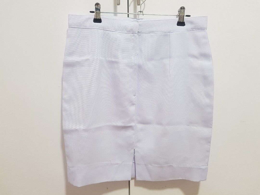 White Uniform (1 set, top & skirt) (Category: Sets or Coordinates) located in Baguio. Submitted by momandshaun (Listing ID 1214258112, Image 3). Description: TOP Shoulder Width: 16in Waist: 15in Length: 22in SKIRT Waist: 30in. Length: 19in. MOP: Gcash only.