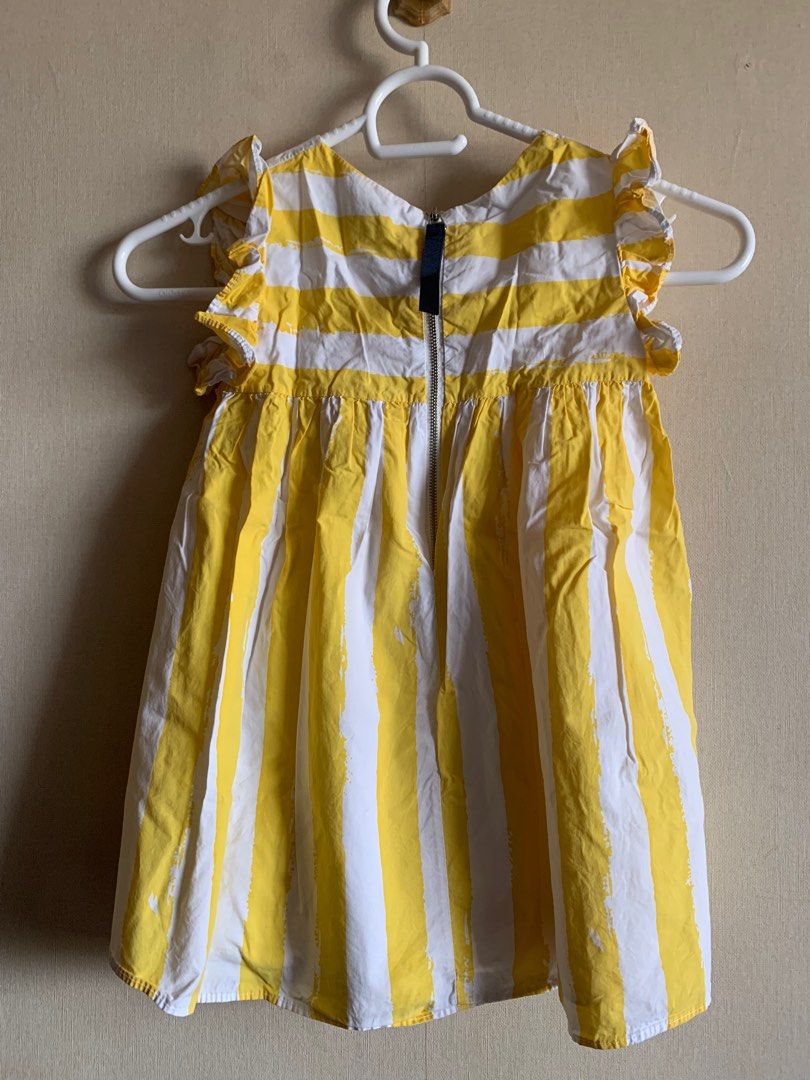 Yellow Sun Dress (Category: Babies & Kids Fashion) located in Quezon City. Submitted by threesuitcaseonly (Listing ID 1214182746, Image 3). Description: Like New No stains No rip Good Condition RFS: outgrown .