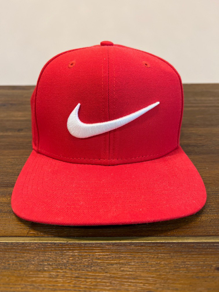 red and white nike cap