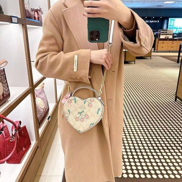 Original COACH Heart Crossbody In Signature Canvas With Heart Cherry Print,  Luxury, Bags & Wallets on Carousell