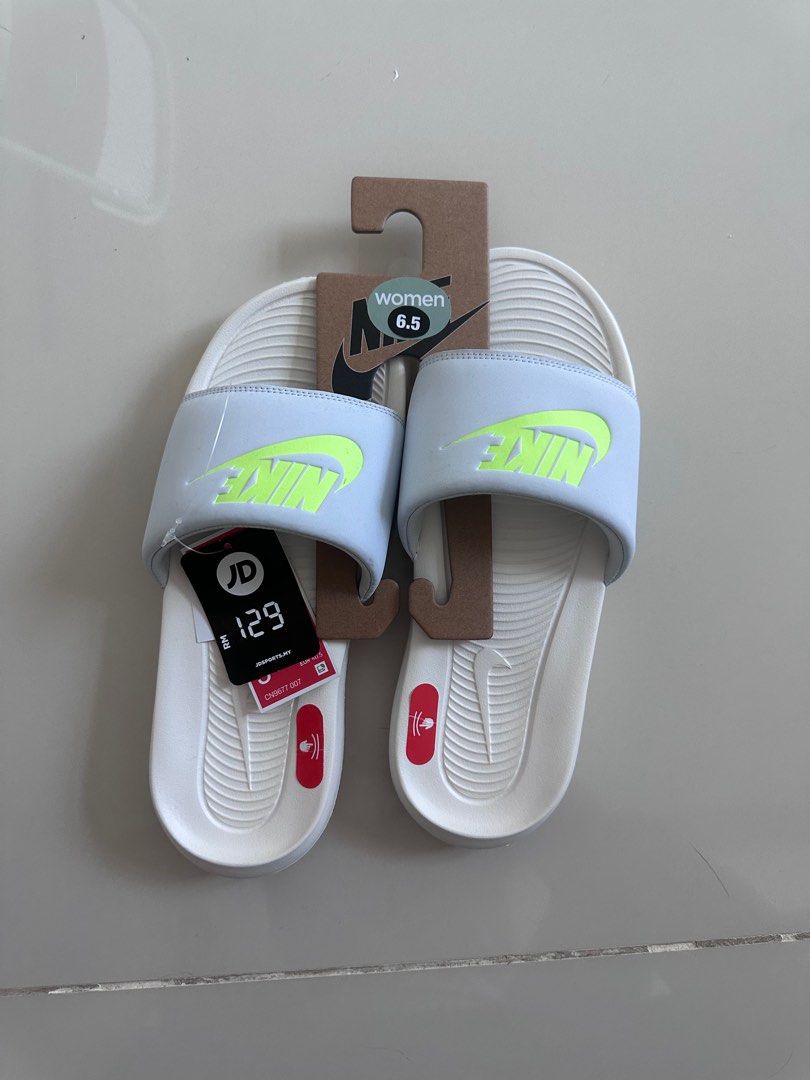 Brand new Nike slides Women s Fashion Footwear Flipflops and