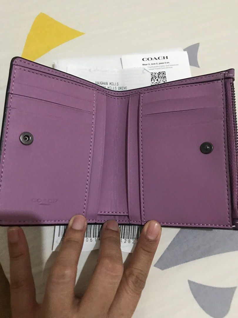Coach Purple Bifold slim wallet (from Retail) (Category: Luxury Bags & Wallets) located in Orani. Submitted by xtine_rose (Listing ID 1219766876, Image 3). Description: .