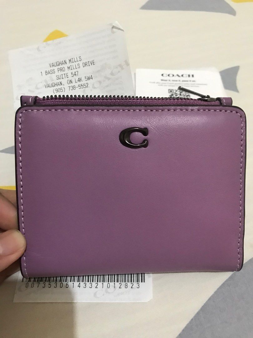 Coach Purple Bifold slim wallet (from Retail) (Category: Luxury Bags & Wallets) located in Orani. Submitted by xtine_rose (Listing ID 1219766876, Image 1). Description: .