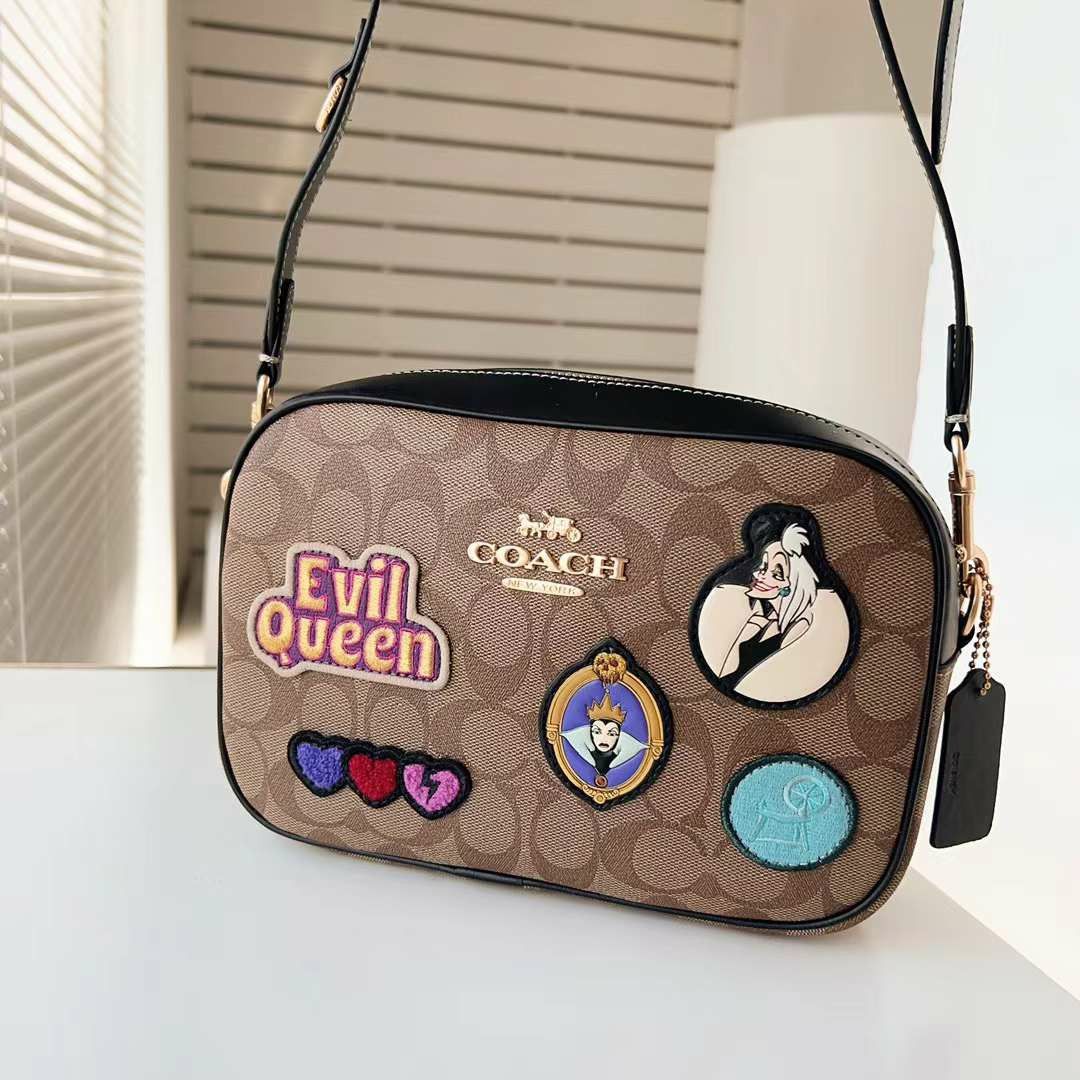 Coach camera 2025 bag disney