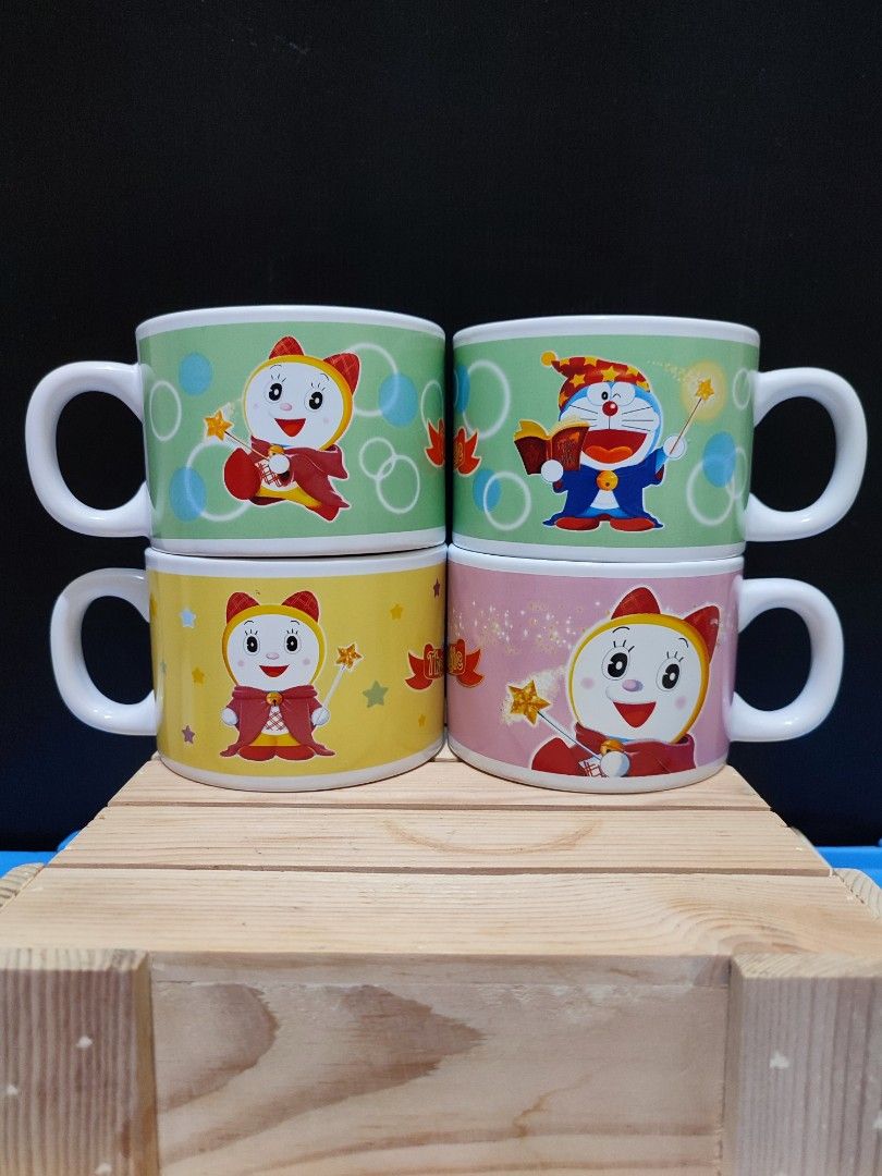 Doraemon Big Coffee Mugs from Japan 4pcs (Category: Coffee & Tea Tableware) located in Las Pinas. Submitted by mariegarcia (Listing ID 1219806782, Image 1). Description: P600 for 4 doraemon mugs Last price/ fixed original from Japan please PM me for more details thank you.