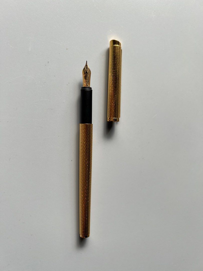 Dunhill Gold Fountain Pen (Category: Luxury Accessories) located in Manila. Submitted by mnlwatchsociety (Listing ID 1219833419, Image 2). Description: Dunhill Gold Plated Fountain Pen 18k gold plated Mint With original box.