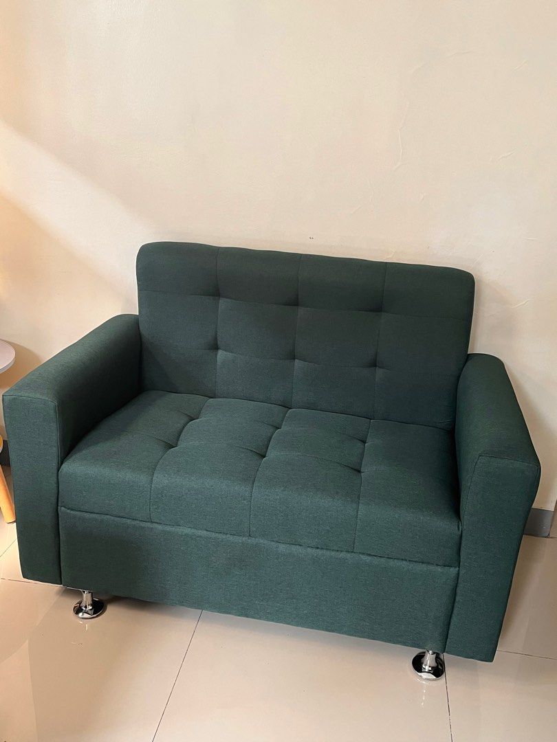 Green Two Seater Sofa (Category: Sofas) located in Paranaque City. Submitted by abby_e_g (Listing ID 1219773354, Image 2). Description: Stainless Steel Feet .