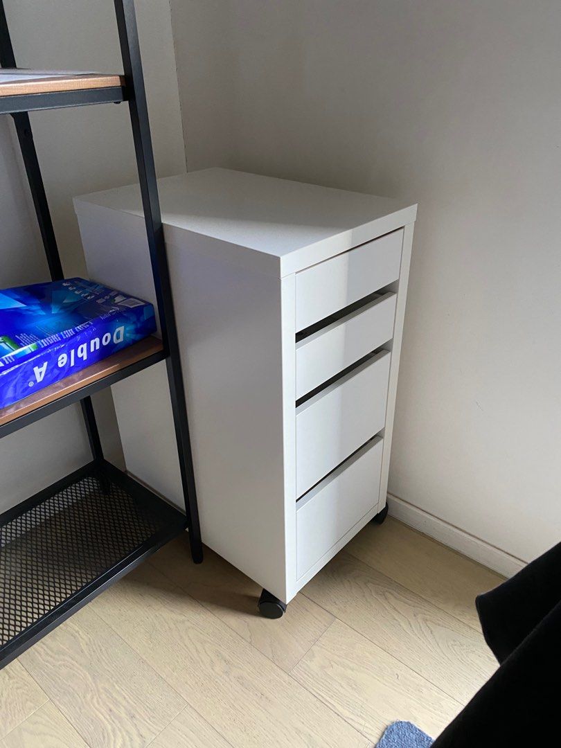 IKEA Bekant Sit/Standing Table can adjust height. With free drawer