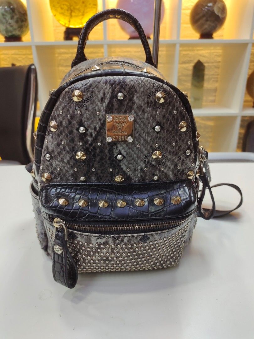 MCM mini backpack, Luxury, Bags & Wallets on Carousell
