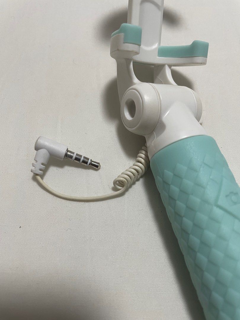 Miniso Selfie Stick (Category: Tripods & Monopods) located in Mandaluyong City. Submitted by mainesells_ (Listing ID 1219912250, Image 3). Description: - Cute light blue Miniso selfie stick - Connects through headphone jack - Silicone-covered handle.