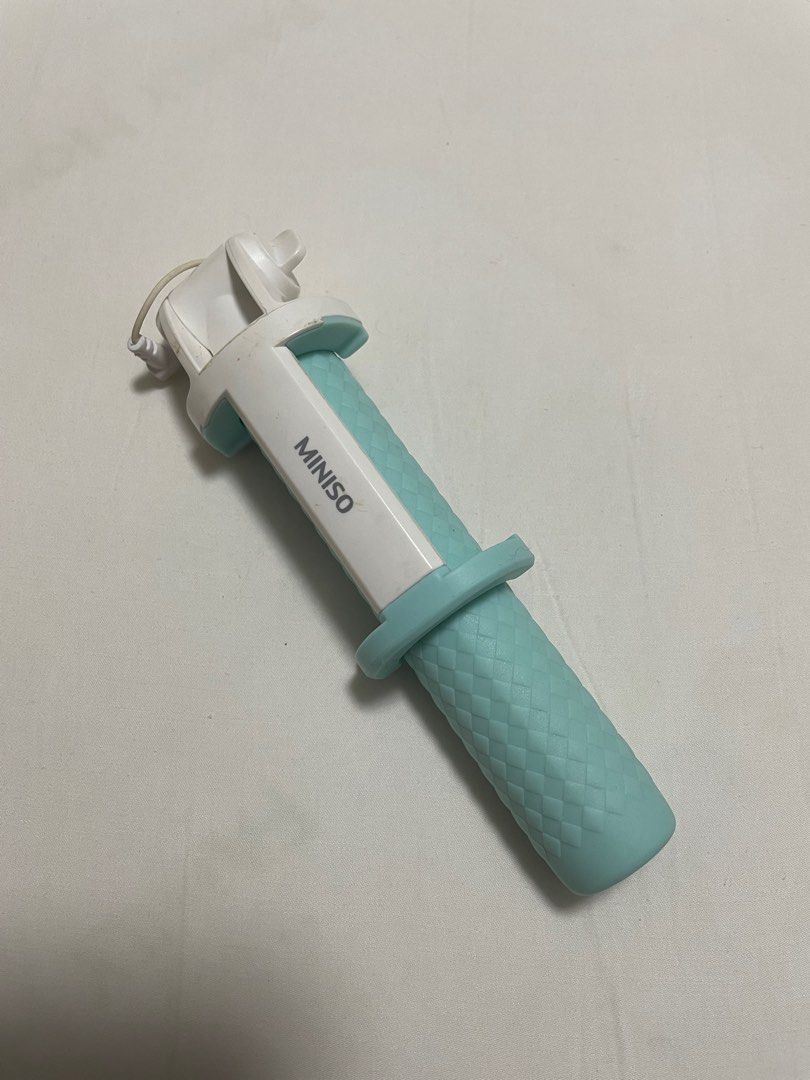 Miniso Selfie Stick (Category: Tripods & Monopods) located in Mandaluyong City. Submitted by mainesells_ (Listing ID 1219912250, Image 1). Description: - Cute light blue Miniso selfie stick - Connects through headphone jack - Silicone-covered handle.