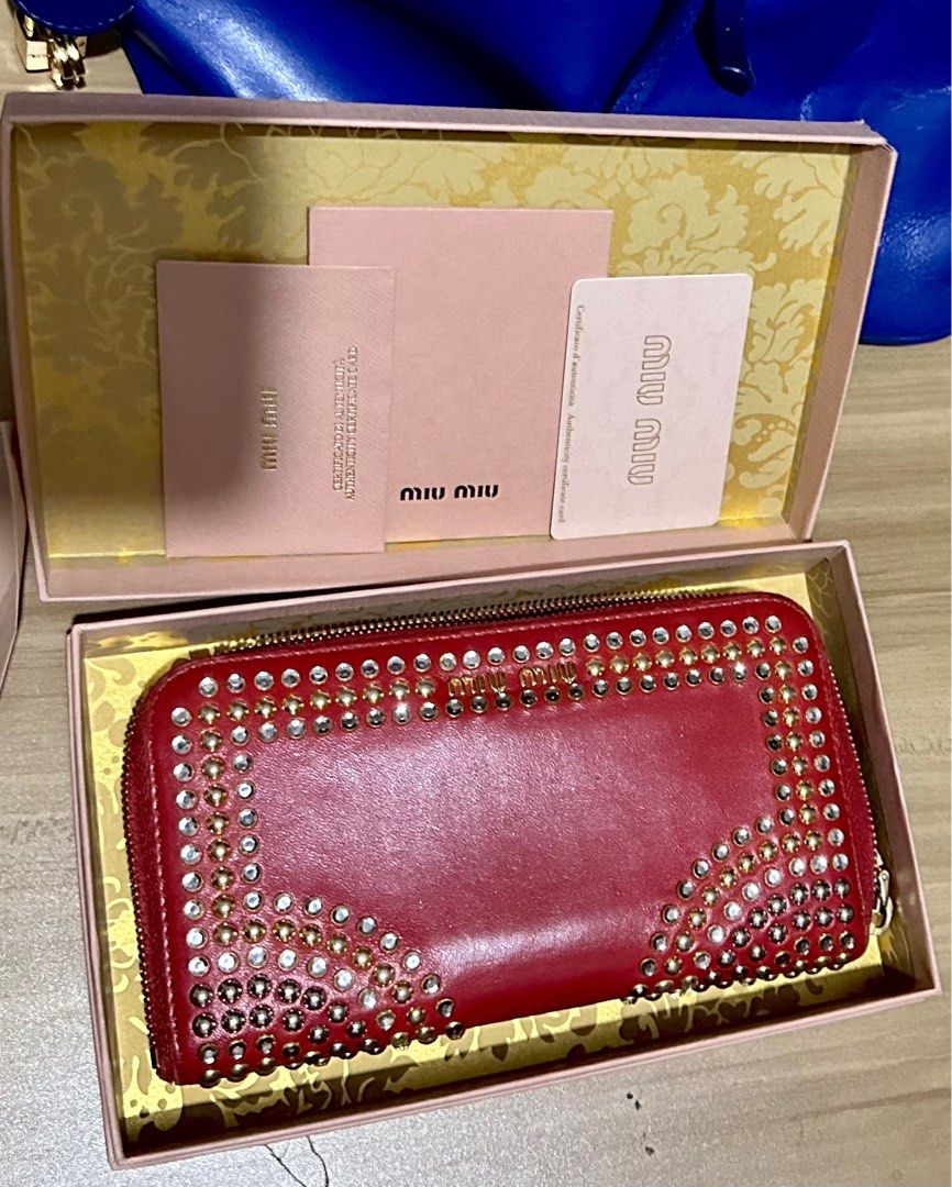 Miu Miu (Category: Luxury Bags & Wallets) located in Quezon City. Submitted by lineprelove23 (Listing ID 1219765212, Image 2). Description: Cute MiuMiu Long wallet with stones like Prada design. Prada and MiuMiu are sister company With box and authenticity card.