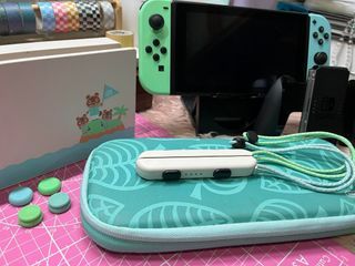 NINTENDO SWITCH CONSOLE WITH ANIMAL CROSSING NEW HORIZON OLED [ASIAN]