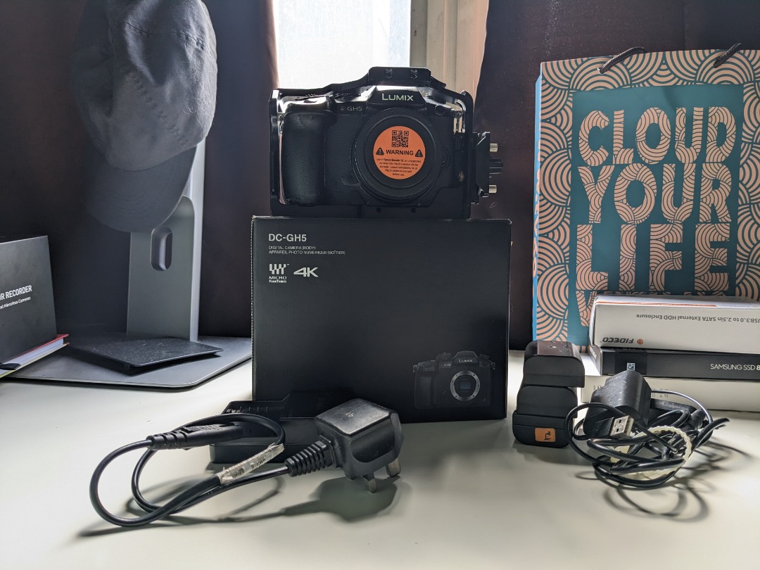 Panasonic Lumix GH5 (with VlogL) + Smallrig Cage + Viltrox x.71 (M43 to EF)+ x1 lens + 4