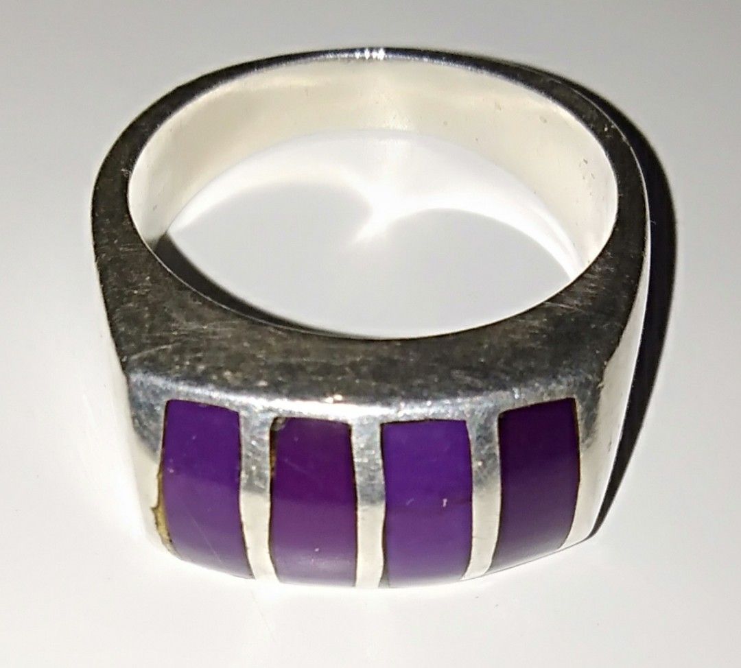 Vintage Navajo-handmade Solid Sterling Silver Sugilite inlay Ring (SIZE 9) (Category: Rings) located in Paranaque City. Submitted by carson2023 (Listing ID 1219826348, Image 1). Description: Guaranteed Authentic Vintage Navajo-handmade Sterling Silver with Multiple Sugilite inlay Ring. Probably purchased from Arizona USA during the 70s SIZE 9 CONDITION: In Very Good Vintage Condition Message me for Inquiries.
