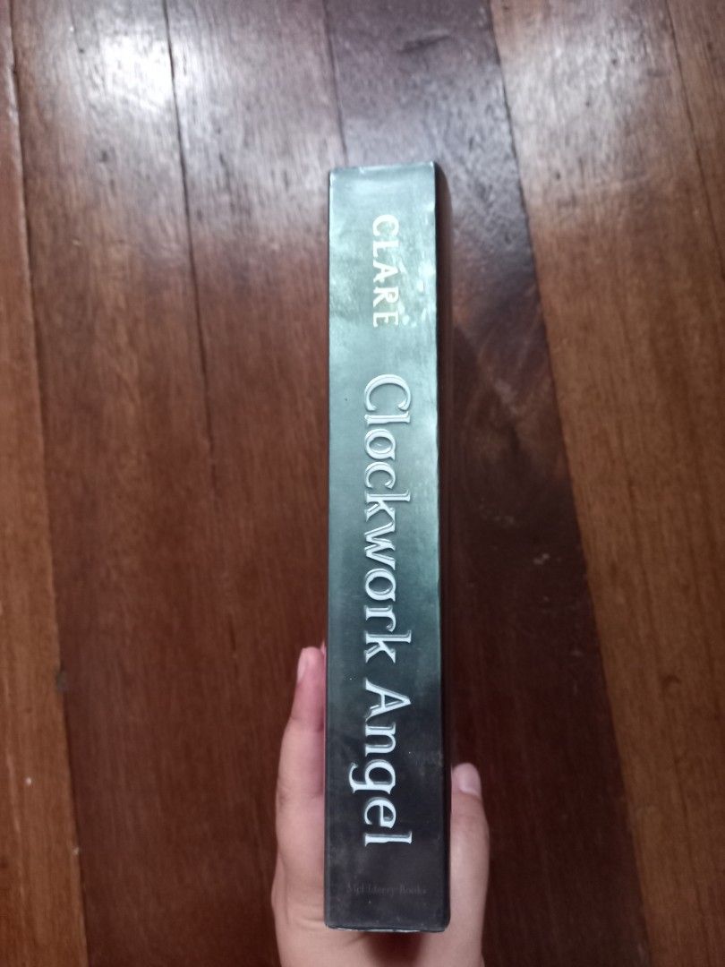 Clockwork Angel by Cassandra Clare (Category: Storybooks) located in Iloilo. Submitted by starlightsaga61 (Listing ID 1215774633, Image 2). Description: All have plastic covers and slight yellowing on the pages, in good condition.