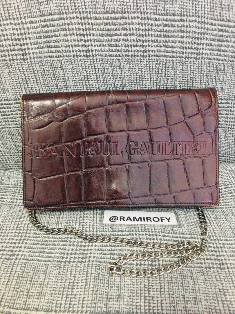 JEAN PAUL GAULTIER Clutch-on-Chain (AUTHENTIC) (Category: Luxury Bags & Wallets) located in Paranaque City. Submitted by ramirofy (Listing ID 1220018698, Image 2). Description: 🚨🚨🚨 SALE - SALE - SALE 🚨🚨🚨 ✅ JEAN PAUL GAULTIER Clutch-on-Chain ✅ SALE Price: Php3,000 (Negotiable) ✅ RANK: BC ✅ Condition: 7/10 ✅ 100% AUTHENTIC ✅ On-Hand ✅ Inclusions: Bag only + Provided Dustbag ✅ Material: Genuine Leather (Croc Stamped) ✅ Condition: - Normal Sign