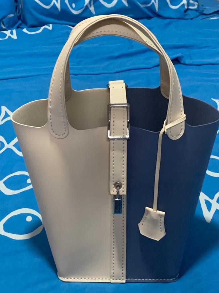 Handbag with best sale lock and key