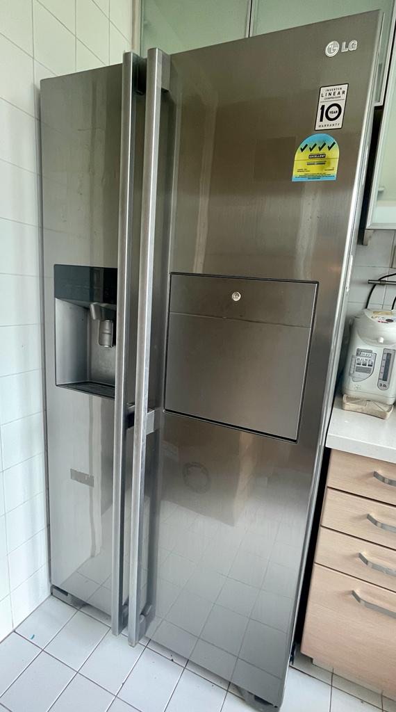 LG sidebyside fridge with noplumbing water and ice dispenser, TV