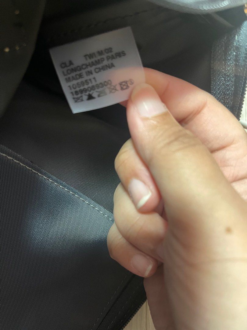 Longchamp (Category: Tote Bags) located in Singapore. Submitted by redreds (Listing ID 1218722921, Image 5). Description: Brand new Authentic Large tote bag with long handles Comes with the green card (4th pic) but lost the receipt .
