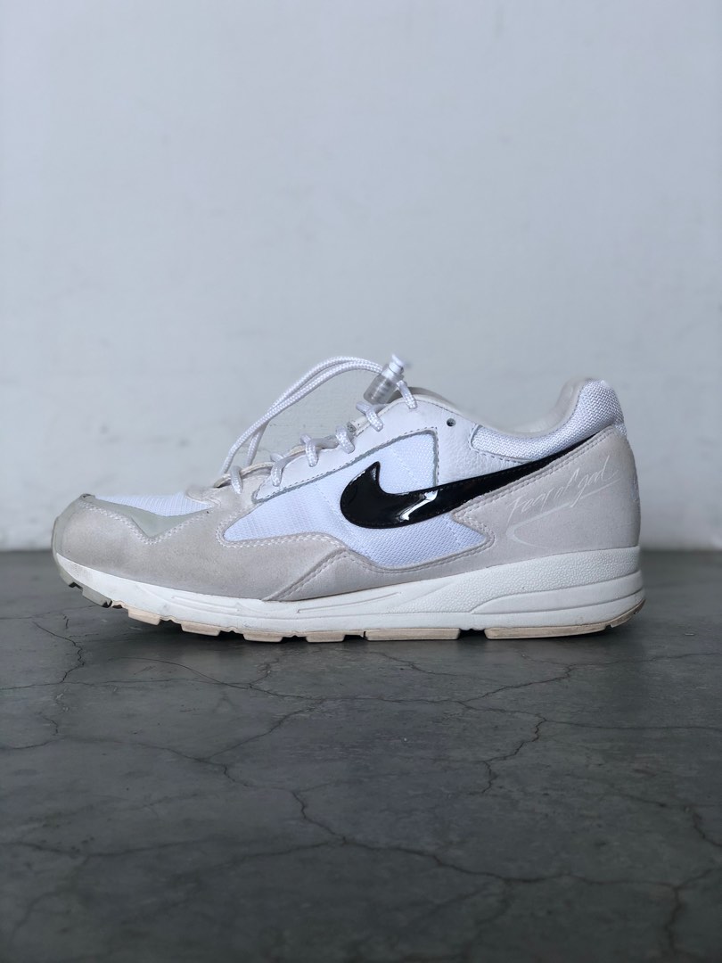 Nike air free of god top