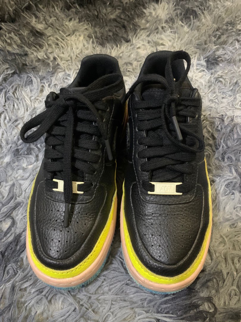 Nike jester black yellow on sale