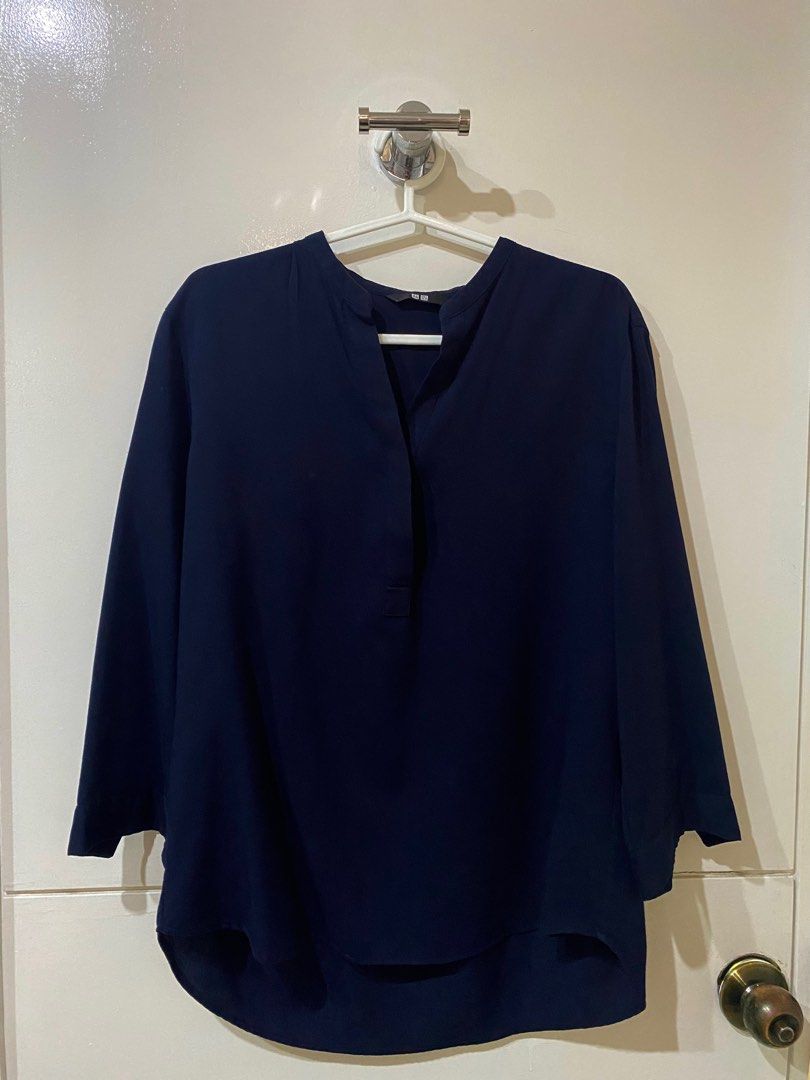 Uniqlo Dark Blue Blouse 3/4 Sleeves Medium (Category: Blouses) located in Paranaque City. Submitted by buttonbabies (Listing ID 1219928343, Image 1). Description: Decluttering my closet. Very nice Uniqlo blouse. Dark Blue. Medium. Carefully stored in a smoke-free home.