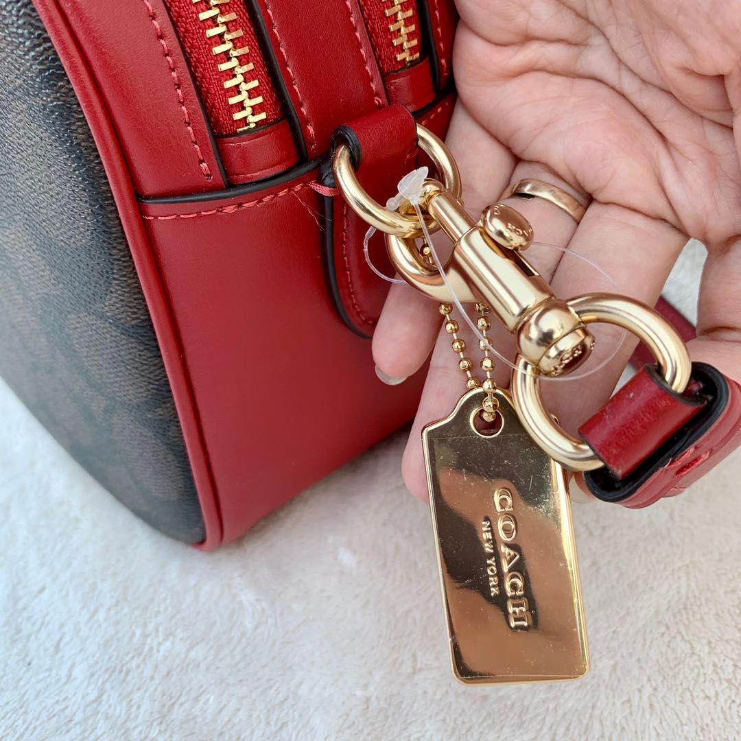 100 AUTH COACH Jes signature mahogany red double zip camera crossbody sling bag Women s Fashion Bags Wallets Cross body Bags on Carousell