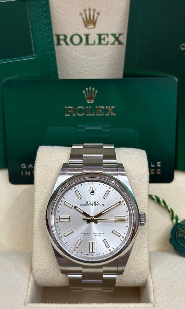 2023 Rolex OP 41 “Silver” (Category: Luxury Watches) located in Makati City. Submitted by grail_luxury (Listing ID 1212836939, Image 1). Description: 2023 Rolex OP 41 Dial: Silver Sunburst 18CT Gold Hands and Markers Case: 41MM Year: AUG 2023 Brand New Ref: 124300 Complete store inclusions Direct Owner .