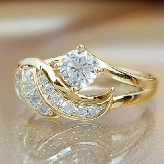 Gold angel ring best sale