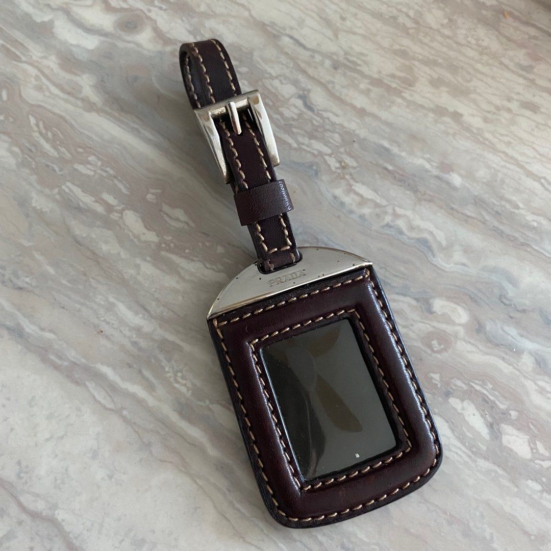 Prada bag tag discount