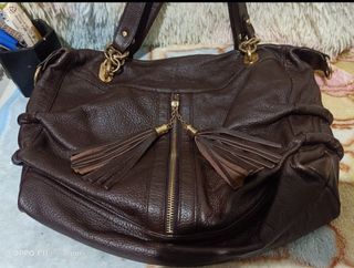 Brown shoulder bag with tassel