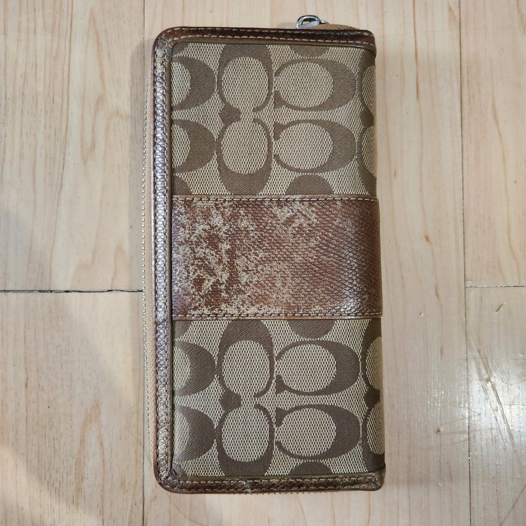 Coach Long Zip Wallet Canvas Khaki (Category: Wallets & Card holders) located in Pasig City. Submitted by mariaspreloved (Listing ID 1220129123, Image 3). Description: coach vintage long zip wallet canvas khaki with gold snake leather details 9/10 condition only issue, replaced zipper.