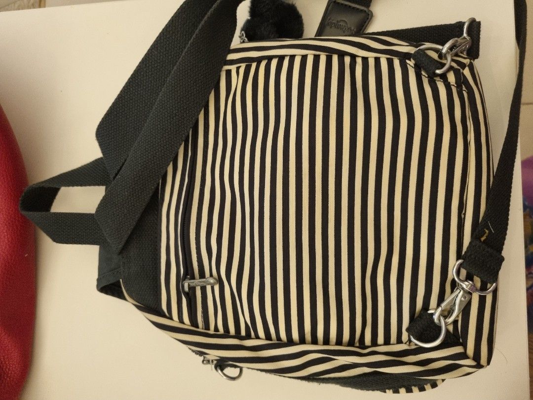 Kipling firefly hot sale up review
