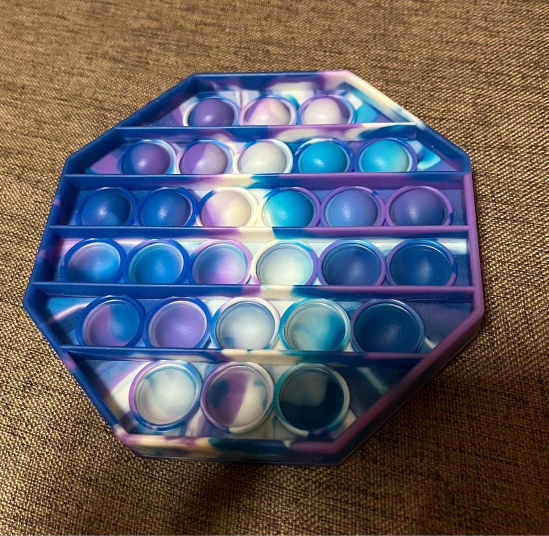 Pop it / fidget toy (Category: Kids Toys) located in Singapore. Submitted by CC.77 (Listing ID 1220262225, Image 1). Description: 🌸Mailing only 🌸 .