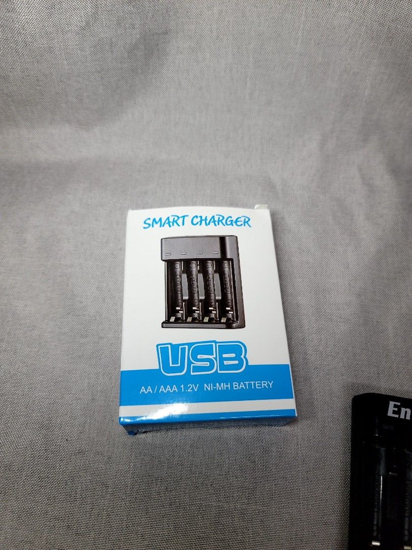 Rechargeable Battery Charger AA AAA (Category: Batteries & Chargers) located in Valenzuela. Submitted by rische (Listing ID 1220207094, Image 2). Description: 》Please make reading a habit《 Like New - tested once to ensure if working Inclusions: Unit charger Micro USB cable Box Input DC 5V 2A Output DC 1.2V *4 500mA Compatible Battery model: AA/AAA 1.2V Ni-MH Rechargeable Battery Bought in Laz.ada, not guaranteed authentic Energizer. https://s.laz