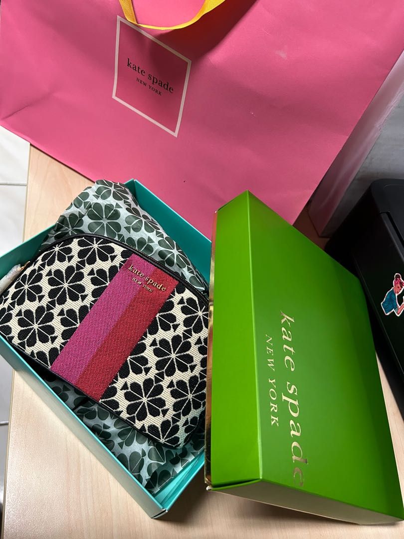 Authentic Kate Spade pouch (Category: Luxury Bags & Wallets) located in Tarlac. Submitted by prelovedbykass (Listing ID 1220423599, Image 1). Description: Kate Spade pouch Original with box, gift card, paper bag.